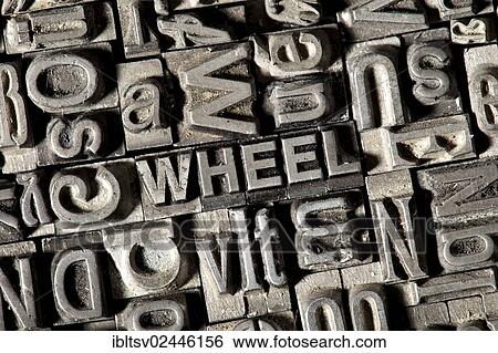 Old lead letters forming the word WHEEL View Large Photo Image Stock Photograph - Old lead letters forming the word WHEEL. Fotosearch