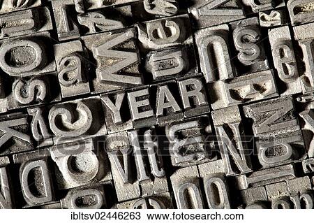 Stock Image - Old lead letters forming the word YEAR. Fotosearch