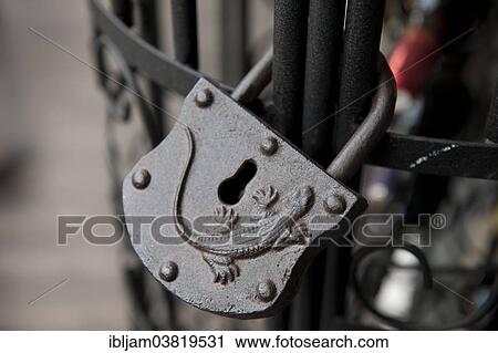 Old lock with reptile relief View Large Photo Image Stock Image - Old lock with reptile relief. Fotosearch