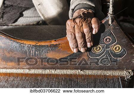 "Old man weaving with a handloom, Chitkul, Himachal Pradesh, India, Asia" View Large Photo Image Stock Image - "Old man weaving with a handloom, Chitkul, Himachal Pradesh, India, Asia". Fotosearch