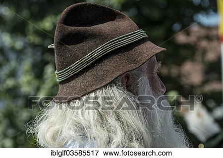 "Old man with long gray hair and a traditional Bavarian hat, Oberlandler Gauverband Trachtenzug traditional costume procession, Fischbachau, Upper Bavaria, Bavaria, Germany, Europe" View Large Photo Image Stock Photo - "Old man with long gray hair and a traditional Bavarian hat, Oberlandler Gauverband Trachtenzug traditional costume procession, Fischbachau, Upper Bavaria, Bavaria, Germany, Europe". Fotosearch