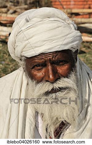 Stock Image - "Old Nepalese man, thoughtful, observant, portrait, Kathmandu, Nepal, Asia". Fotosearch