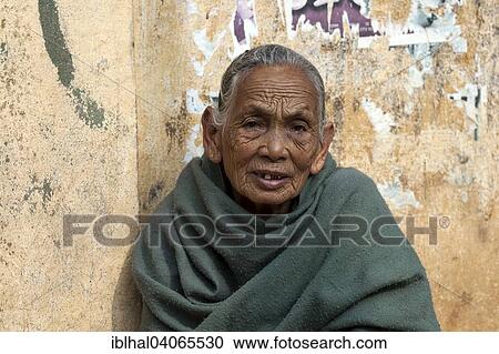 "Old Nepalese woman with green cape, portrait, Bandipur, Nepal, Asia" View Large Photo Image Stock Image - "Old Nepalese woman with green cape, portrait, Bandipur, Nepal, Asia". Fotosearch