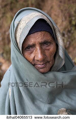 Stock Image - "Old Nepalese woman with headscarf, portrait, Bandipur, Nepal, Asia". Fotosearch