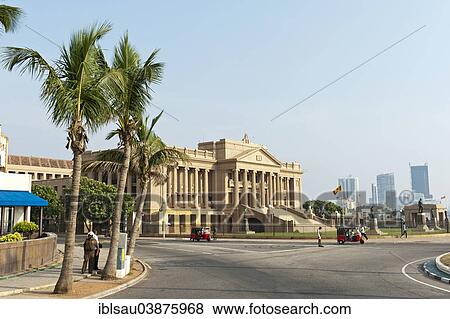 Stock Photo - "Old Parliament, neoclassical architecture under palm trees, Colombo, Sri Lanka, Asia". Fotosearch