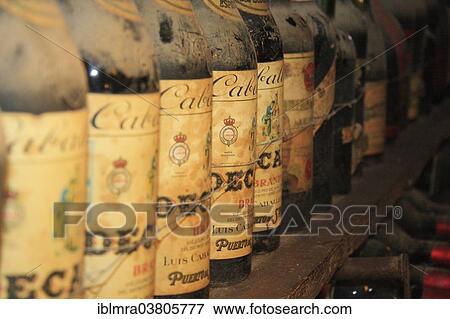 "Old red wine bottles in a historic wine cellar, Chianti region, Tuscany, Italy, Europe" View Large Photo Image Stock Photo - "Old red wine bottles in a historic wine cellar, Chianti region, Tuscany, Italy, Europe". Fotosearch