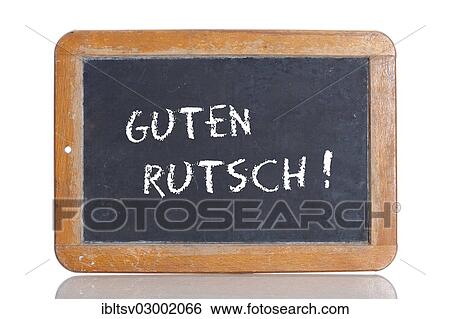 Stock Photograph - "Old school blackboard with the phrase GUTEN RUTSCH!, German for Happy New Year! ". Fotosearch