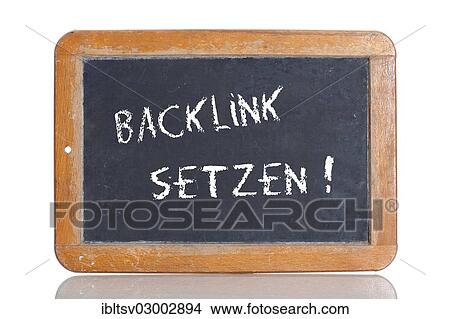 Picture - "Old school blackboard with the term BACKLINK SETZEN, German for to set a backlink". Fotosearch