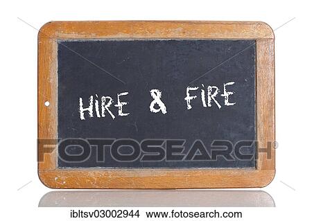 Picture - Old school blackboard with the term HIRE and FIRE. Fotosearch