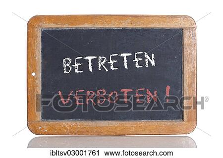 Stock Image - "Old school blackboard with the words BETRETEN VERBOTEN!, German for No trespassing! ". Fotosearch