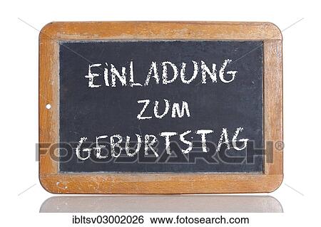 Stock Photograph - "Old school blackboard with the words EINLADUNG ZUM GEBURTSTAG, German for Invitation to a birthday party". Fotosearch