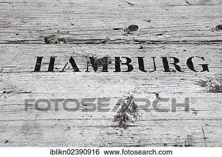 "Old sea crate with the lettering """"Hamburg"""" on wood" View Large Photo Image Stock Photograph - "Old sea crate with the lettering """"Hamburg"""" on wood". Fotosearch