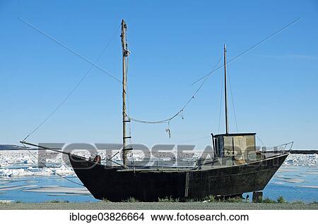 "Old ship on the shore of the Beaufort Sea, Arctic Ocean, Victoria Island, formerly Holman Island, village of Ulukhaktok, Northwest Territories, Canada, North America" View Large Photo Image Picture - "Old ship on the shore of the Beaufort Sea, Arctic Ocean, Victoria Island, formerly Holman Island, village of Ulukhaktok, Northwest Territories, Canada, North America". Fotosearch