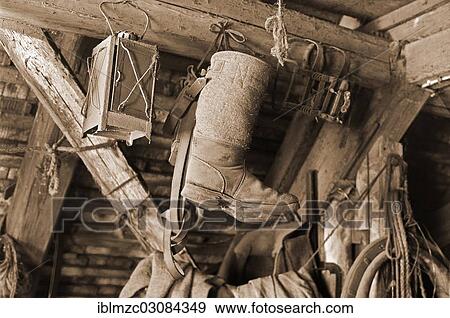 "Old stable lantern and felt boots hanging in an attic, Franconian farm, Eckenhaid, Eckental, Middle Franconia, Bavaria, Germany, Europe" View Large Photo Image Stock Photo - "Old stable lantern and felt boots hanging in an attic, Franconian farm, Eckenhaid, Eckental, Middle Franconia, Bavaria, Germany, Europe". Fotosearch