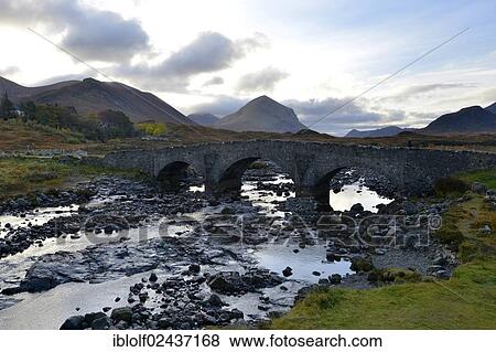 "Old stone bridge in front of the Black Cullins Mountains, Sligachan, Isle of Skye, Scotland, United Kingdom, Europe" View Large Photo Image Stock Photo - "Old stone bridge in front of the Black Cullins Mountains, Sligachan, Isle of Skye, Scotland, United Kingdom, Europe". Fotosearch