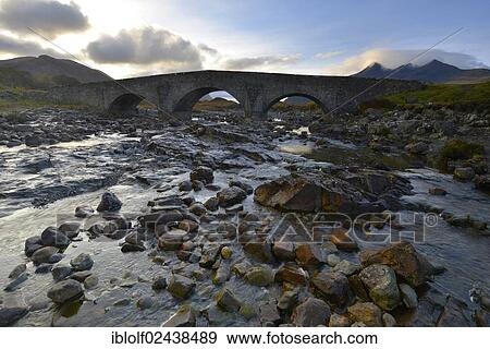 "Old stone bridge in front of the Black Cullins Mountains, Sligachan, Isle of Skye, Scotland, United Kingdom, Europe" View Large Photo Image Stock Photo - "Old stone bridge in front of the Black Cullins Mountains, Sligachan, Isle of Skye, Scotland, United Kingdom, Europe". Fotosearch