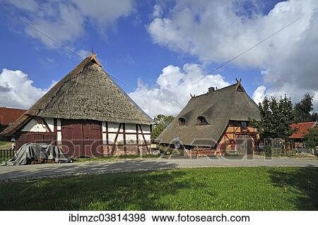 "Old thatched farmhouses in a village square, Vitense, Mecklenburg-Vorpommern, Germany, Europe" View Large Photo Image Stock Photo - "Old thatched farmhouses in a village square, Vitense, Mecklenburg-Vorpommern, Germany, Europe". Fotosearch