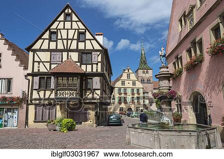 Stock Photo - "Old town centre with fountain, Turckheim, Alsace, France, Europe". Fotosearch