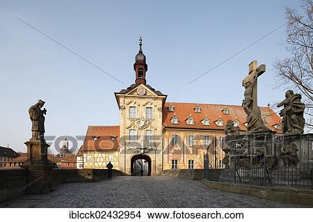 Picture - "Old town hall on the Regnitz river, gate at the Obere Bruecke bridge with the statue of St. Nepomuk and the crucifixion group, Bamberg, Upper Franconia, Bavaria, Germany, Europe". Fotosearch