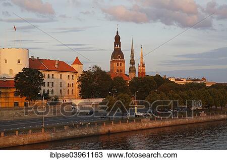 "Old town with the banks of the Daugava River, Riga Castle, Riga Cathedral, St. Peter's Church, from the Vansu Bridge or Vansu tilts over Daugava, Riga, Latvia, Europe" View Large Photo Image Stock Image - "Old town with the banks of the Daugava River, Riga Castle, Riga Cathedral, St. Peter's Church, from the Vansu Bridge or Vansu tilts over Daugava, Riga, Latvia, Europe". Fotosearch
