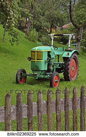 "Old tractor, wooden fence, bad Wiessee, Bavaria, Germany, Europe, PublicGround, Europe" View Large Photo Image Stock Photography - "Old tractor, wooden fence, bad Wiessee, Bavaria, Germany, Europe, PublicGround, Europe". Fotosearch