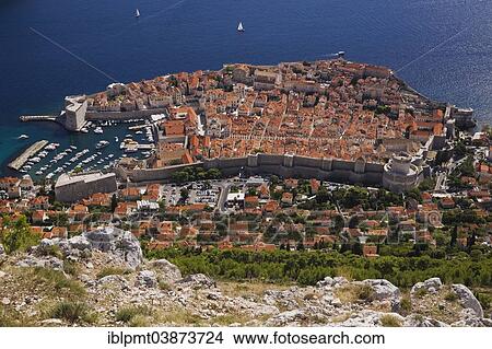 "Old walled city of Dubrovnik overlooking the Adriatic Sea, from Mount Srd, Dubrovnik, Dalmatia, Croatia, Europe" View Large Photo Image Picture - "Old walled city of Dubrovnik overlooking the Adriatic Sea, from Mount Srd, Dubrovnik, Dalmatia, Croatia, Europe". Fotosearch
