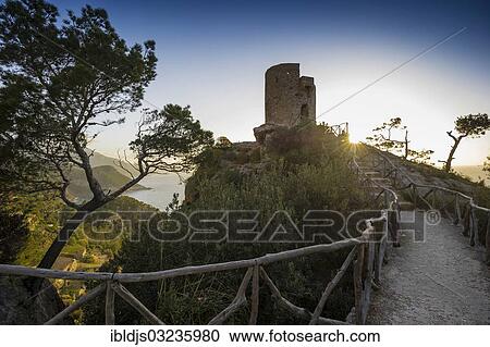 "Old watchtower on the coast at sunset, Torre Talaia de Ses Animes, Banyalbufar, Majorca, Balearic Islands, Spain, Europe" View Large Photo Image Stock Image - "Old watchtower on the coast at sunset, Torre Talaia de Ses Animes, Banyalbufar, Majorca, Balearic Islands, Spain, Europe". Fotosearch