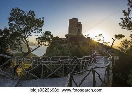 "Old watchtower on the coast at sunset, Torre Talaia de Ses Animes, Banyalbufar, Majorca, Balearic Islands, Spain, Europe" View Large Photo Image Stock Photography - "Old watchtower on the coast at sunset, Torre Talaia de Ses Animes, Banyalbufar, Majorca, Balearic Islands, Spain, Europe". Fotosearch