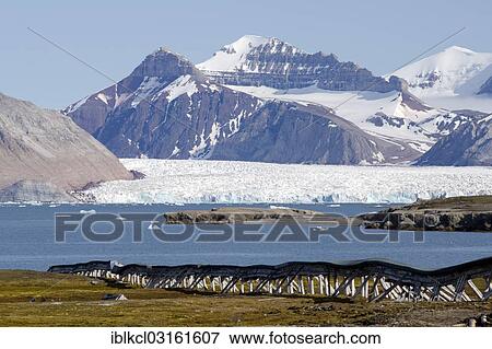 "Old water pipeline built above ground on stilts because of the permafrost, Kongsfjorden, Ny-Alesund, Spitsbergen Island, Svalbard Archipelago, Svalbard and Jan Mayen, Norway, Europe" View Large Photo Image Stock Photo - "Old water pipeline built above ground on stilts because of the permafrost, Kongsfjorden, Ny-Alesund, Spitsbergen Island, Svalbard Archipelago, Svalbard and Jan Mayen, Norway, Europe". Fotosearch