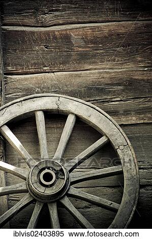 Stock Photography - Old wheel of wagon. Fotosearch