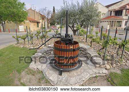 "Old wine press in a roundabout, Noves, Bouches-du-Rhone, Provence-Alpes-Cote d'Azur, Southern France, France, Europe" View Large Photo Image Stock Image - "Old wine press in a roundabout, Noves, Bouches-du-Rhone, Provence-Alpes-Cote d'Azur, Southern France, France, Europe". Fotosearch