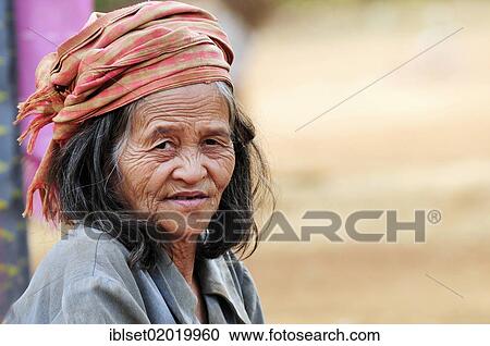 "Old woman wearing a head scarf, portrait, Bolaven Plateau, southern Laos, Southeast Asia, Asia" View Large Photo Image Stock Image - "Old woman wearing a head scarf, portrait, Bolaven Plateau, southern Laos, Southeast Asia, Asia". Fotosearch