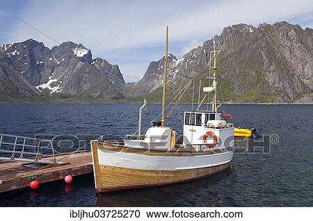 "Old wooden fishing boat in front of Lofoten scenery, Reine, Moskenesoy, Lofoten, Nordland, Norway, Europe" View Large Photo Image Stock Image - "Old wooden fishing boat in front of Lofoten scenery, Reine, Moskenesoy, Lofoten, Nordland, Norway, Europe". Fotosearch
