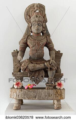 Stock Photo - "Old wooden sculpture, depicting a Hindu deity, Kochi, Kerala, India, Asia". Fotosearch