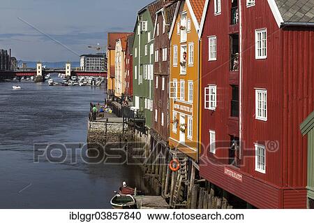 Stock Image - "Old wooden warehouses on the Nidelva River, Trondheim, Sor-Trondelag, Trondelag, Norway, Europe". Fotosearch