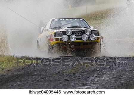 "Oldtimer Eifel Rallye Festival in 2014, WP 1 Bosch Super Stage, crossing a water hole, Daun, Vulkaneifel, Eifel, Rhineland-Palatinate, Germany, Europe" View Large Photo Image Stock Photograph - "Oldtimer Eifel Rallye Festival in 2014, WP 1 Bosch Super Stage, crossing a water hole, Daun, Vulkaneifel, Eifel, Rhineland-Palatinate, Germany, Europe". Fotosearch