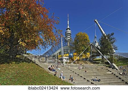 Olympiapark gardens with apple trees (Malus spp. ), Pavilion-roof of the Olympic Hall, the Theatron and the television tower, Munich, Bavaria, Germany, Europe View Large Photo Image Picture - Olympiapark gardens with apple trees (Malus spp. ), Pavilion-roof of the Olympic Hall, the Theatron and the television tower, Munich, Bavaria, Germany, Europe. Fotosearch