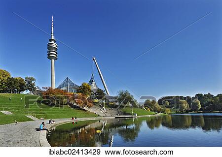 Olympic Park with the tent roof of the Olympic stadium, Theatron lakeside stage and the TV Tower, Munich, Bavaria, Germany, Europe View Large Photo Image Stock Photo - Olympic Park with the tent roof of the Olympic stadium, Theatron lakeside stage and the TV Tower, Munich, Bavaria, Germany, Europe. Fotosearch