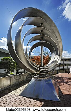 "Olympic Rings, artwork by Ruth Kiener-Flamm, 1972, revised version by Peter Schwenk in 2000, former Olympic Village, Munich, Bavaria, Germany, Europe" View Large Photo Image Stock Photo - "Olympic Rings, artwork by Ruth Kiener-Flamm, 1972, revised version by Peter Schwenk in 2000, former Olympic Village, Munich, Bavaria, Germany, Europe". Fotosearch