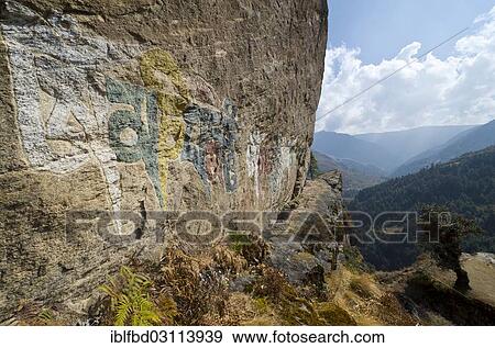"Om mani padme hum"""" mantra painted at a big rock, mountains in the background, Junbesi, Solukhumbu District, Sagarmatha Zone, Nepal, Asia" View Large Photo Image Stock Photo - "Om mani padme hum"""" mantra painted at a big rock, mountains in the background, Junbesi, Solukhumbu District, Sagarmatha Zone, Nepal, Asia". Fotosearch
