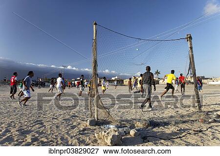 "Omanis playing football, Mirbat, Dhofar region, Sultanate of Oman, Arabian Peninsula" View Large Photo Image Stock Photo - "Omanis playing football, Mirbat, Dhofar region, Sultanate of Oman, Arabian Peninsula". Fotosearch