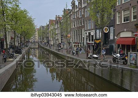 "On Oudezijds Achterburgwal canal, Amsterdam, Holland" View Large Photo Image Stock Photography - "On Oudezijds Achterburgwal canal, Amsterdam, Holland". Fotosearch