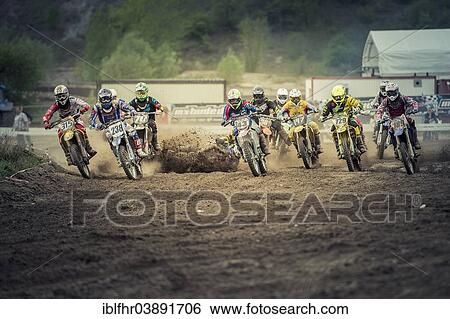 "One motocross rider falling immediately after the start of a race, Grevenbroich, North Rhine-Westphalia, Germany, Europe" View Large Photo Image Stock Photograph - "One motocross rider falling immediately after the start of a race, Grevenbroich, North Rhine-Westphalia, Germany, Europe". Fotosearch