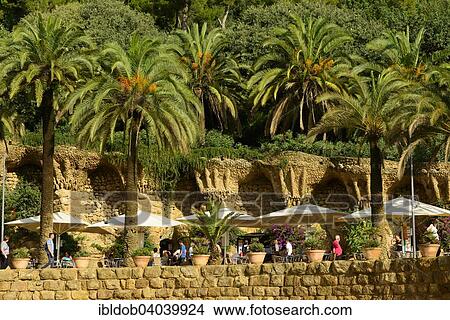 "Open-air restaurant under palm trees, Parc Guell, by architect Antoni Gaudi, Barcelona, ​​Catalonia, Spain, Europe" View Large Photo Image Picture - "Open-air restaurant under palm trees, Parc Guell, by architect Antoni Gaudi, Barcelona, ​​Catalonia, Spain, Europe". Fotosearch