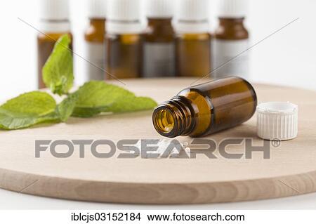 "Open bottle with globules on a wooden board, homoeopathy, Lindlar, Bergisches Land, Germany, Europe" View Large Photo Image Picture - "Open bottle with globules on a wooden board, homoeopathy, Lindlar, Bergisches Land, Germany, Europe". Fotosearch