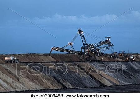 "Open-cast lignite mining, spreader, Juchen lookout point, Garzweiler open-cast mine, Juchen, North Rhine-Westphalia, Germany, Europe" View Large Photo Image Stock Photo - "Open-cast lignite mining, spreader, Juchen lookout point, Garzweiler open-cast mine, Juchen, North Rhine-Westphalia, Germany, Europe". Fotosearch