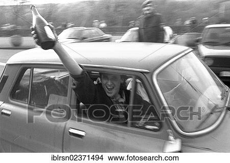 "Open inner-German border between Lower Saxony and the district of Erfurt, Thuringia, in the morning after the opening of the border was announced, GDR citizens leaving on the road from Worbis to Duderstadt, Duderstadt, Lower Saxony, Germany, Europe" View Large Photo Image Picture - "Open inner-German border between Lower Saxony and the district of Erfurt, Thuringia, in the morning after the opening of the border was announced, GDR citizens leaving on the road from Worbis to Duderstadt, Duderstadt, Lower Saxony, Germany, Europe". Fotosearch