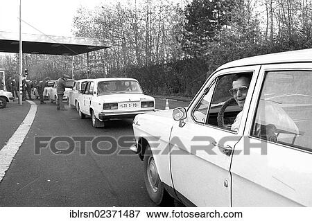 "Open inner-German border between Lower Saxony and the district of Erfurt, Thuringia, in the morning after the opening of the border was announced, GDR citizens leaving on the road from Worbis to Duderstadt, Duderstadt, Lower Saxony, Germany, Europe" View Large Photo Image Stock Photo - "Open inner-German border between Lower Saxony and the district of Erfurt, Thuringia, in the morning after the opening of the border was announced, GDR citizens leaving on the road from Worbis to Duderstadt, Duderstadt, Lower Saxony, Germany, Europe". Fotosearch