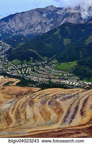 "Open pit ore mining and workers' settlements, Erzberg mountain at Eisenerz, Styria, Austria, Europe" View Large Photo Image Stock Image - "Open pit ore mining and workers' settlements, Erzberg mountain at Eisenerz, Styria, Austria, Europe". Fotosearch
