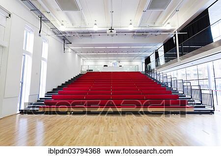 "Open retractable seating at the school hall, Notting Hill and Ealing High School, Ealing, London, England" View Large Photo Image Stock Photo - "Open retractable seating at the school hall, Notting Hill and Ealing High School, Ealing, London, England". Fotosearch